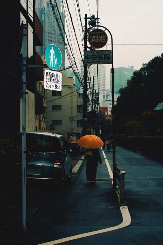 street in Tokyo with umbrella